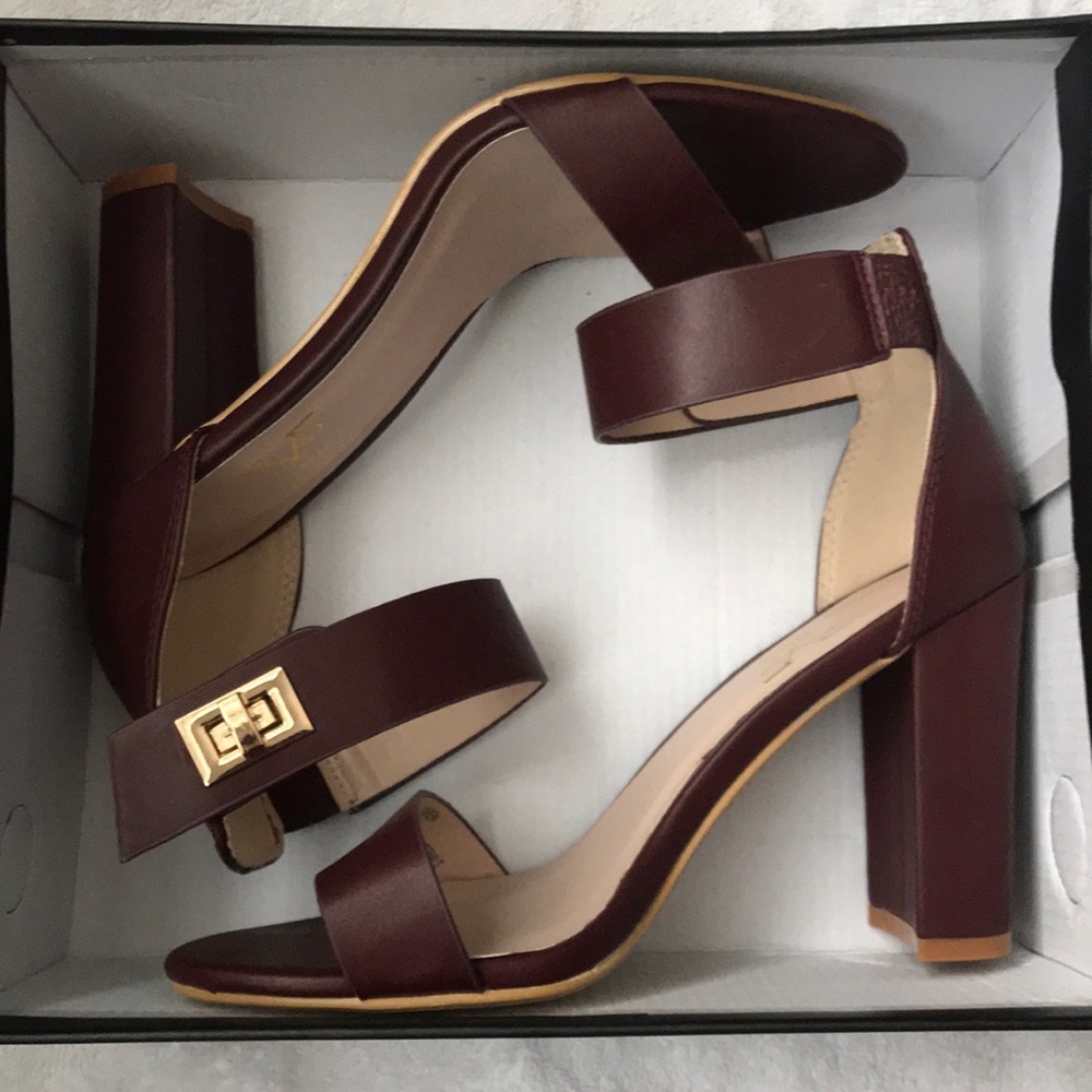 Strappy burgundy heels with gold clasp